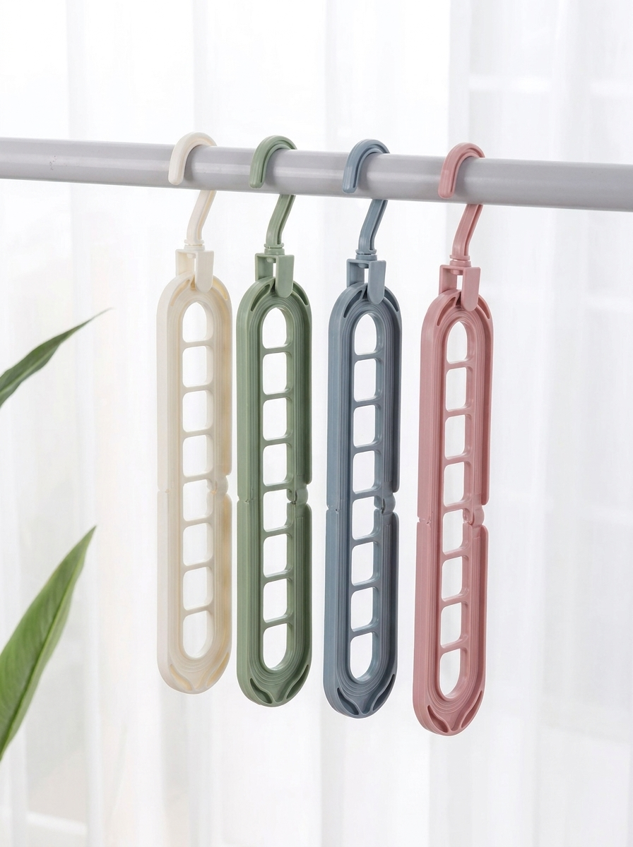 Four nine-hole hangers hanging vertically, showing the nine slots and rotating hook