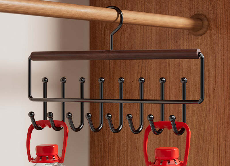Eight-hook rail rack holding two weighted jugs, showing load capacity
