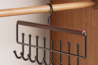 Beech and black wrought-iron eight-hook rack on a closet rail